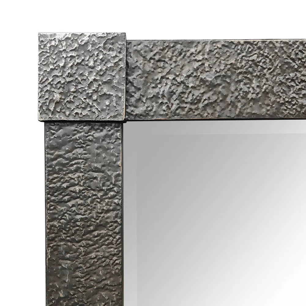 Textured mirror frame corner on a white background
