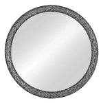 Round mirror with decorative black frame on a white background