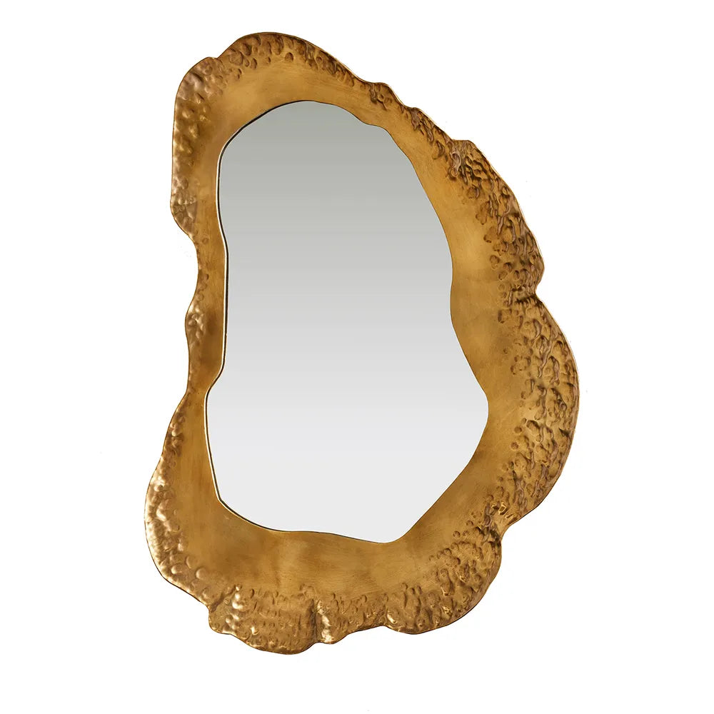 Decorative gold mirror with an intricate frame on a white background