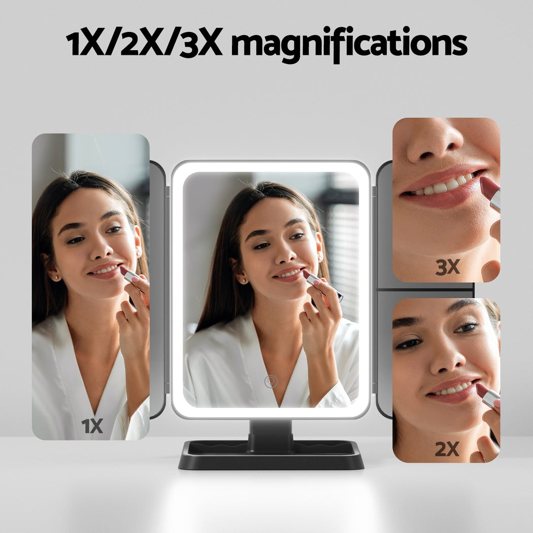 Makeup mirror with 1X, 2X, and 3X magnifications showing a woman applying lipstick.